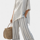 Lada – Elegant Asymmetric Shirt with Striped Trousers