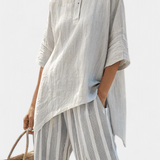 Lada – Elegant Asymmetric Shirt with Striped Trousers