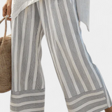 Lada – Elegant Asymmetric Shirt with Striped Trousers